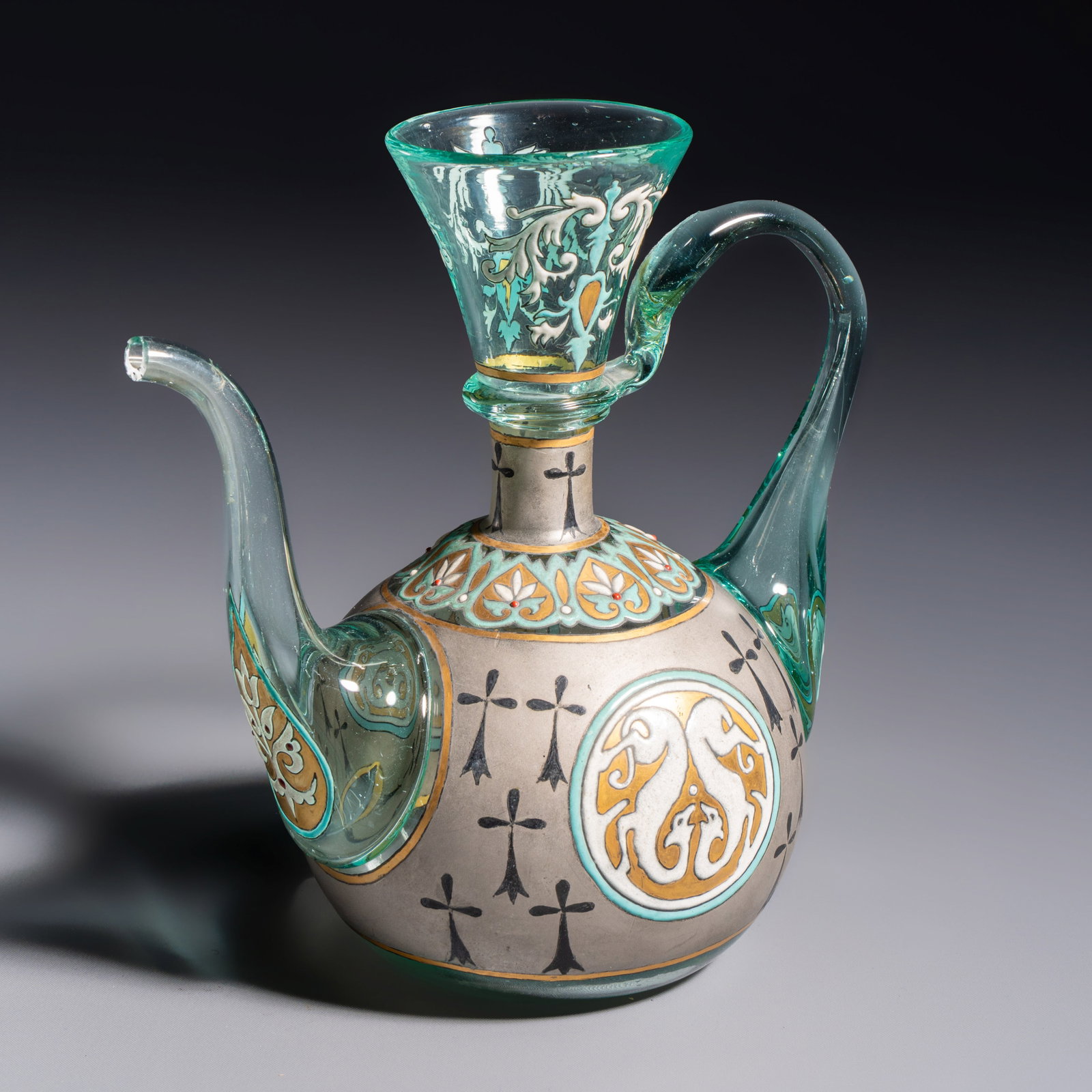 An Orientalist enamelled glass ewer, probably France, 19th C.: An Orientalist enamelled glass ewer, probably France, 19th C. L.: 16 cm - H.: 17,5 cm