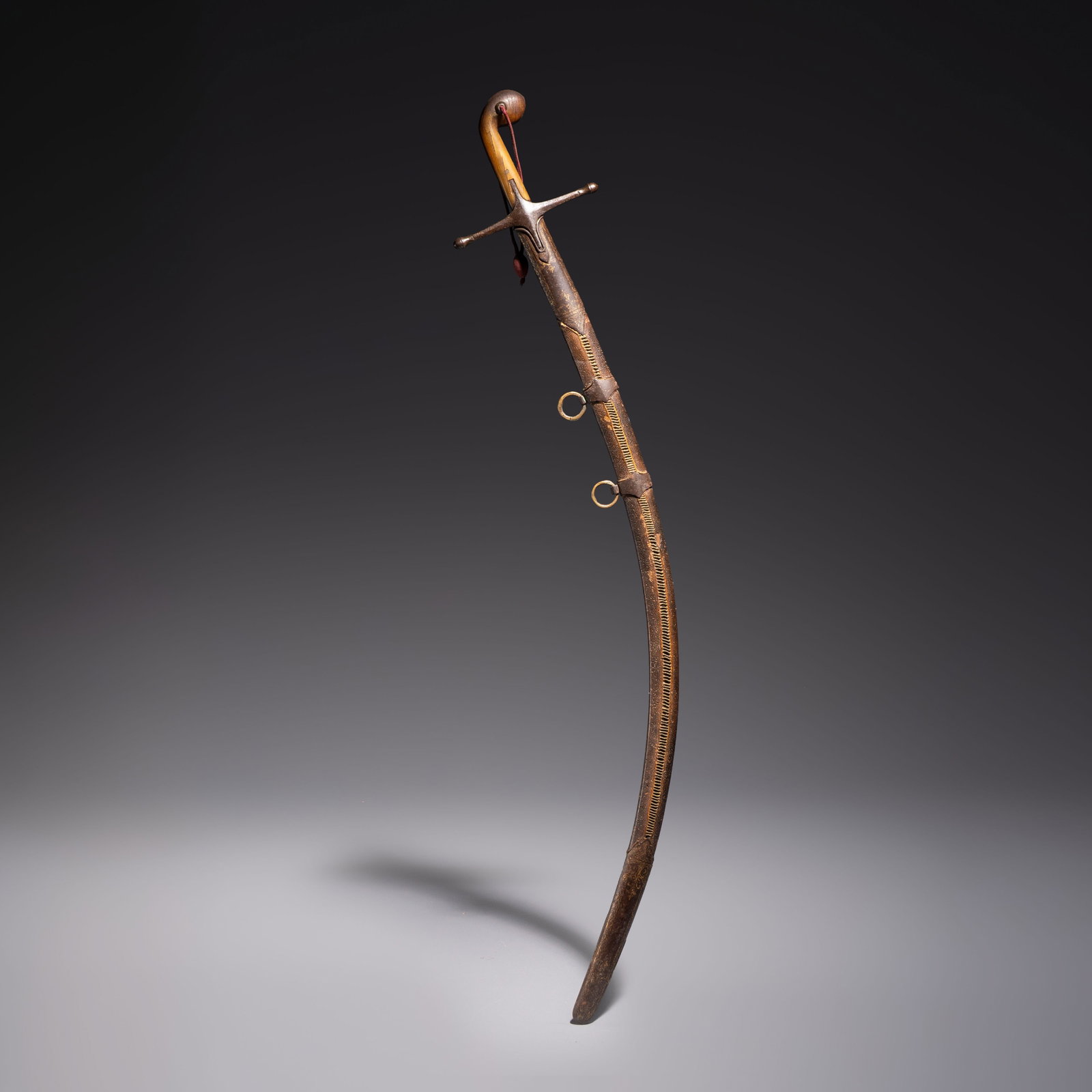An Ottoman shamshir-type sabre with gilt-iron-mounted scabbard and horn hilt, Turkey, 19th C. (1 of 7)