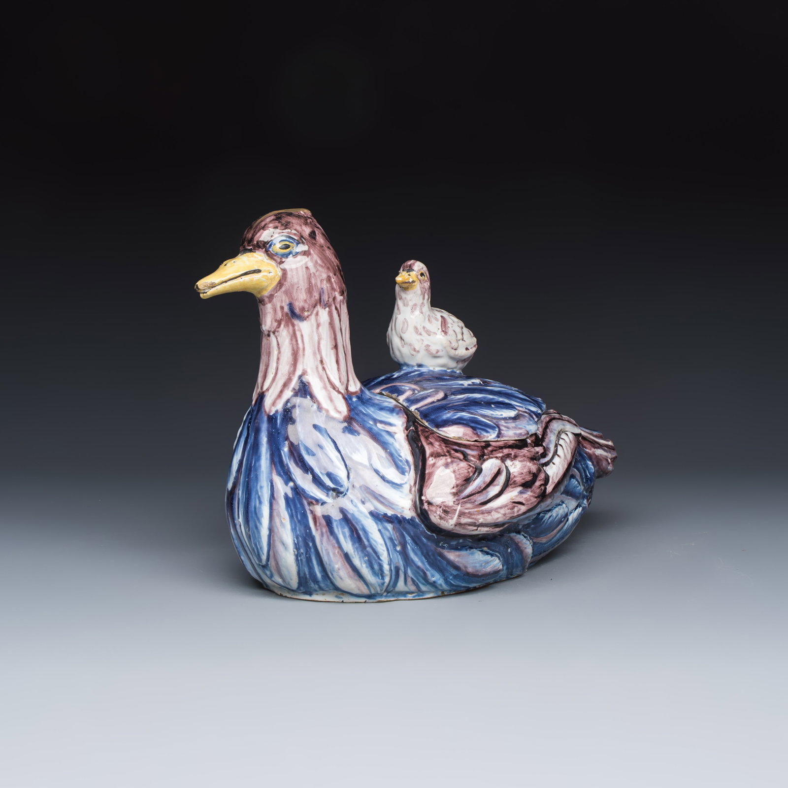 A rare polychrome German faience 'Hen and Chick' tureen and cover, 18th C.: A rare polychrome German faience 'Hen and Chick' tureen and cover, 18th C. L.: 35,7 cm - H.: 24,7 cm | incl. cover