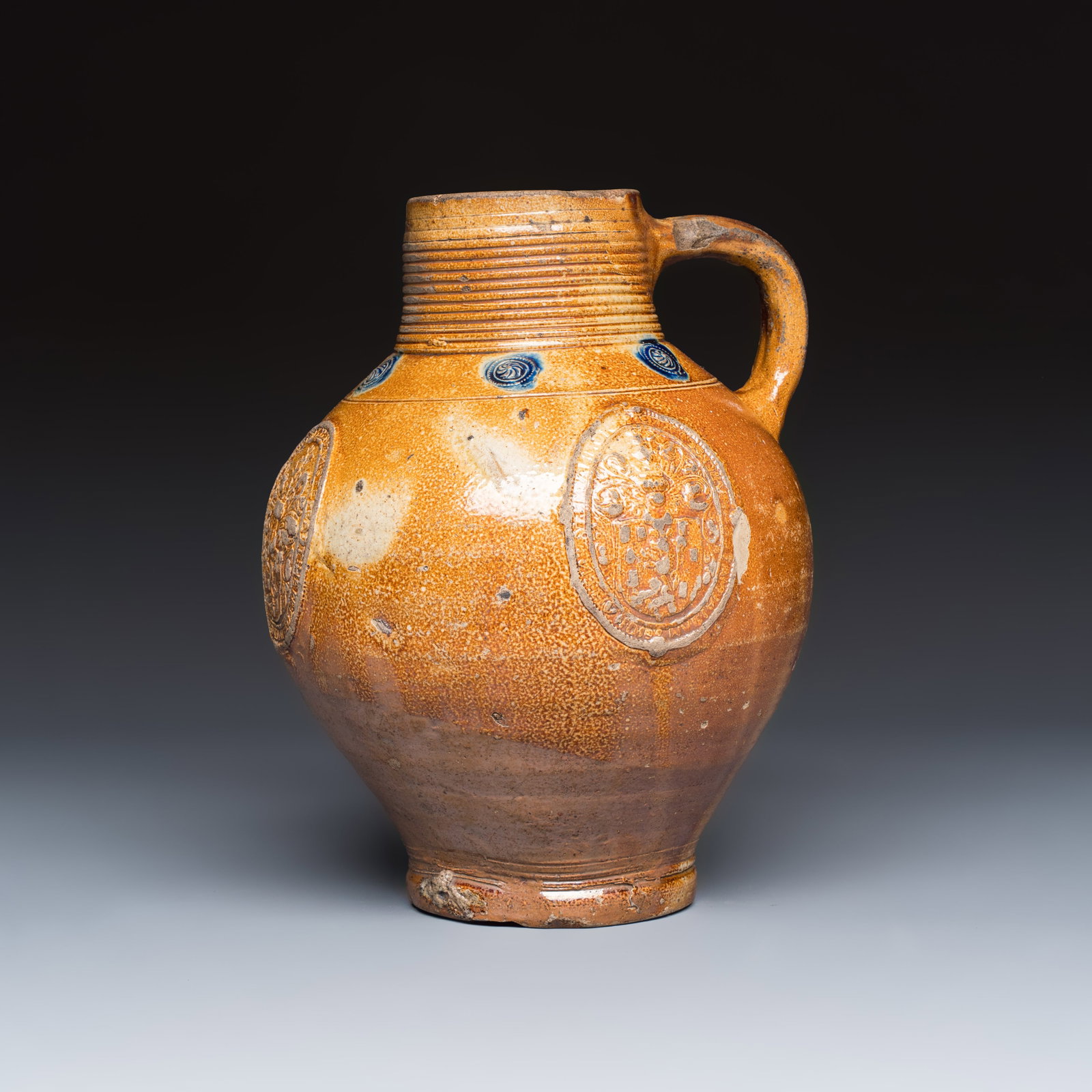 A brown-glazed stoneware jug with the arms of Van Stepradt, Southern Netherlands, dated 1633 (1 of 7)