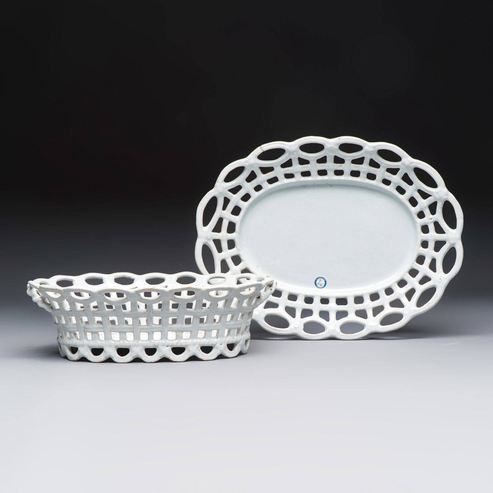 A white-glazed Brussels faience reticulated bread basket and stand, 18th C. (1 of 10)