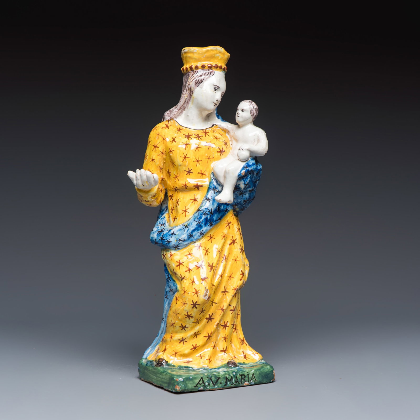 A polychrome Brussels faience model of the Madonna with Child, 18th C. (1 of 7)