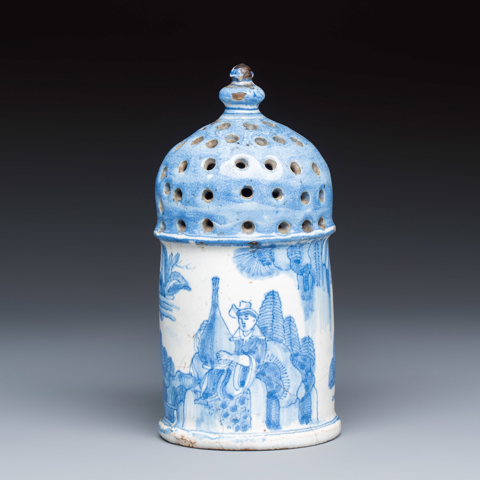 A very rare and early blue and white Dutch Delft chinoiserie caster, 17th C. (1 of 7)