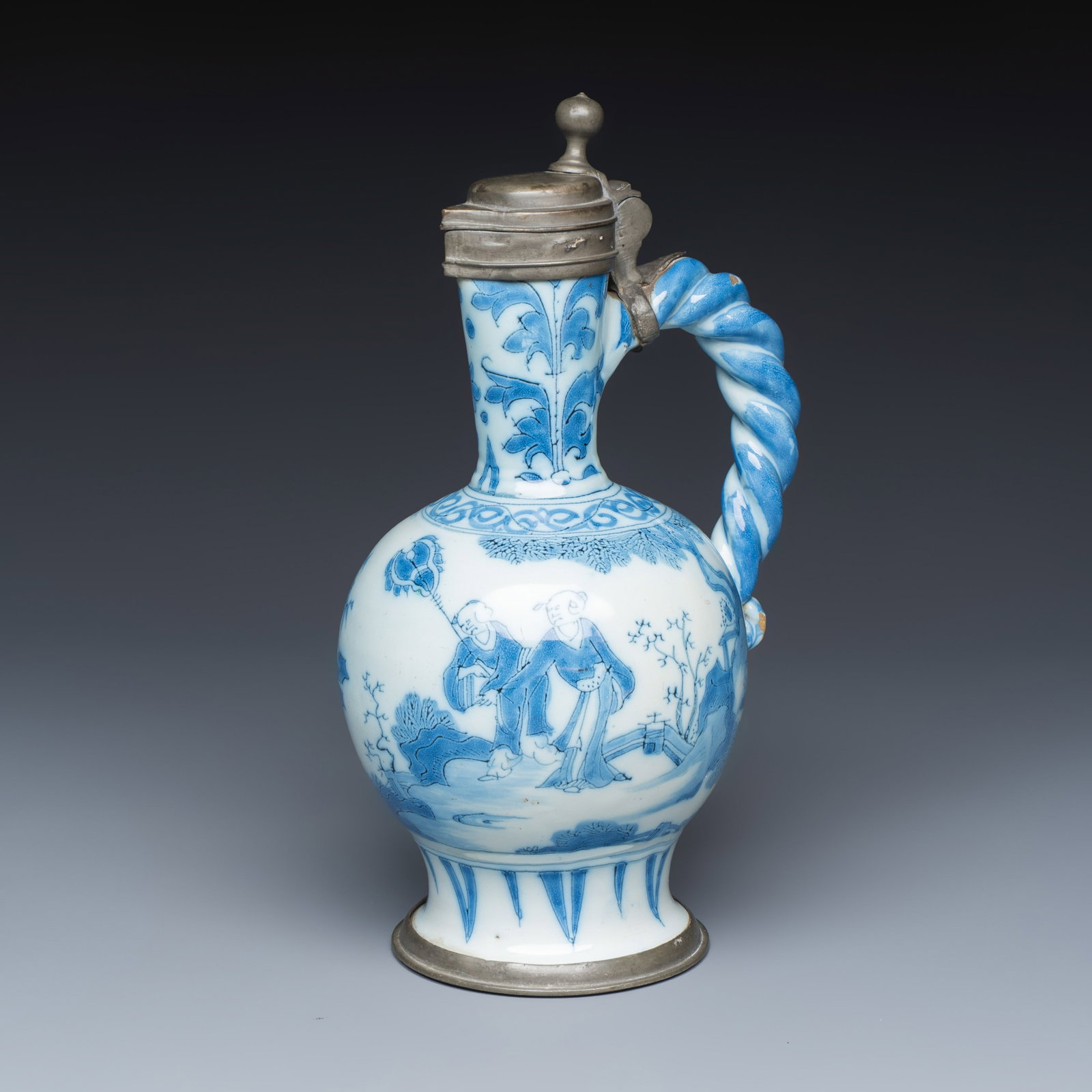 A blue and white Dutch Delft rope-handled chinoiserie jug with a mounted pewter lid, 17th C. (1 of 8)