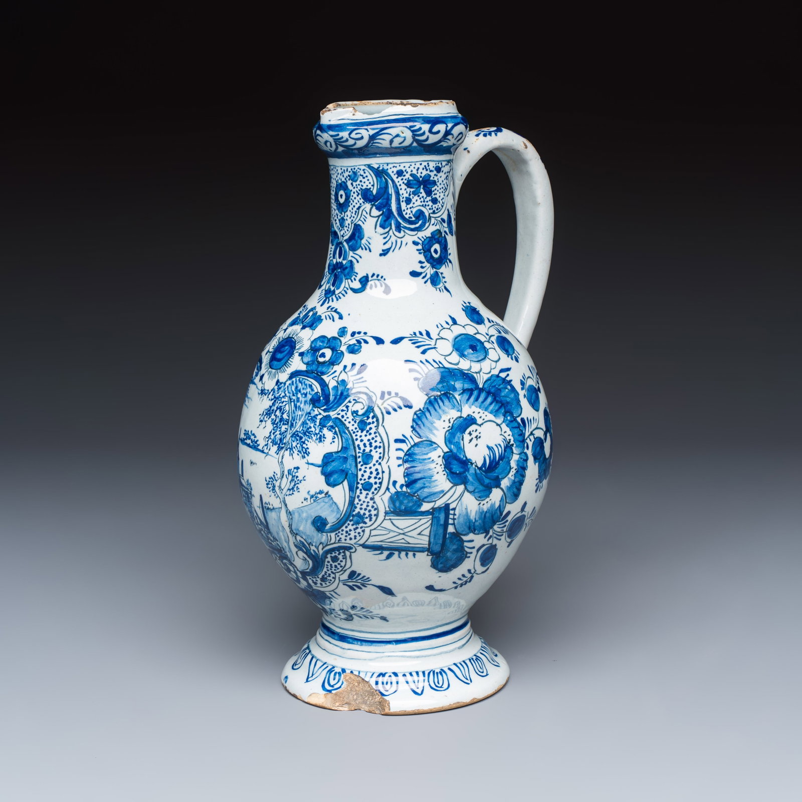 A blue and white Dutch Delft 'Pastoral Landscape' ewer, 18th C.: A blue and white Dutch Delft 'Pastoral Landscape' ewer, 18th C. L.: 16,4 cm - H.: 26,1 cm