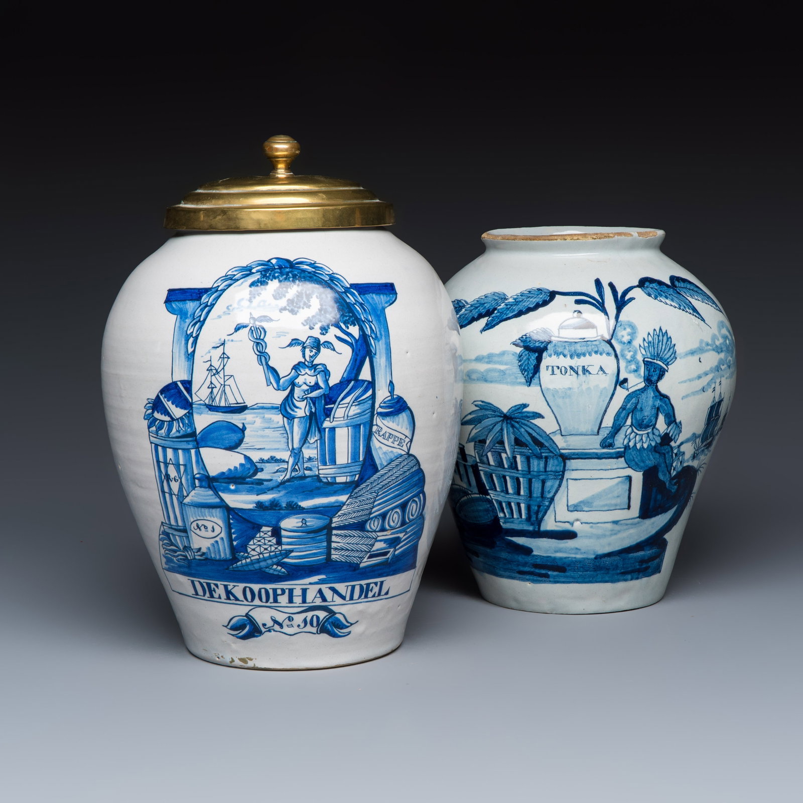 Two blue and white Dutch Delft tobacco jars inscribed 'DE KOOPHANDEL' and 'TONKA', 18th C. (1 of 9)