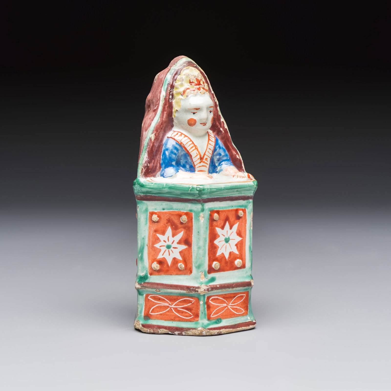 An unusual polychrome Dutch Delft model of a child in a highchair, 18th C.: An unusual polychrome Dutch Delft model of a child in a highchair, 18th C. H.: 12,5 cm