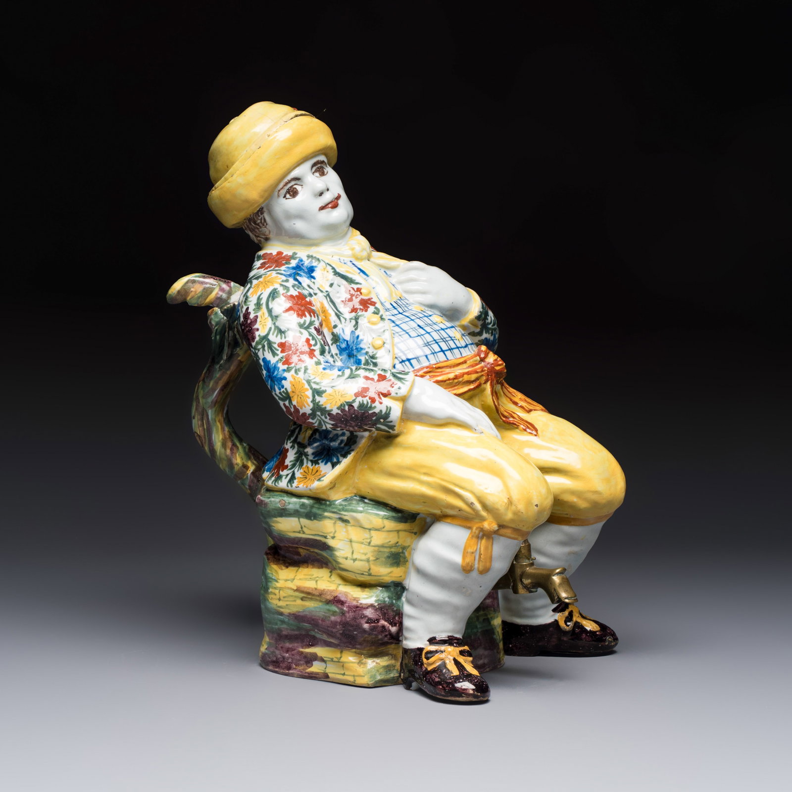 A polychrome Dutch Delft 'Bobbejak' table fountain and cover, 18th C.: A polychrome Dutch Delft 'Bobbejak' table fountain and cover, 18th C. H.: 31 cm | incl. cover With a label of 'R. Gecken (?)', 1933, lot no. 146.
