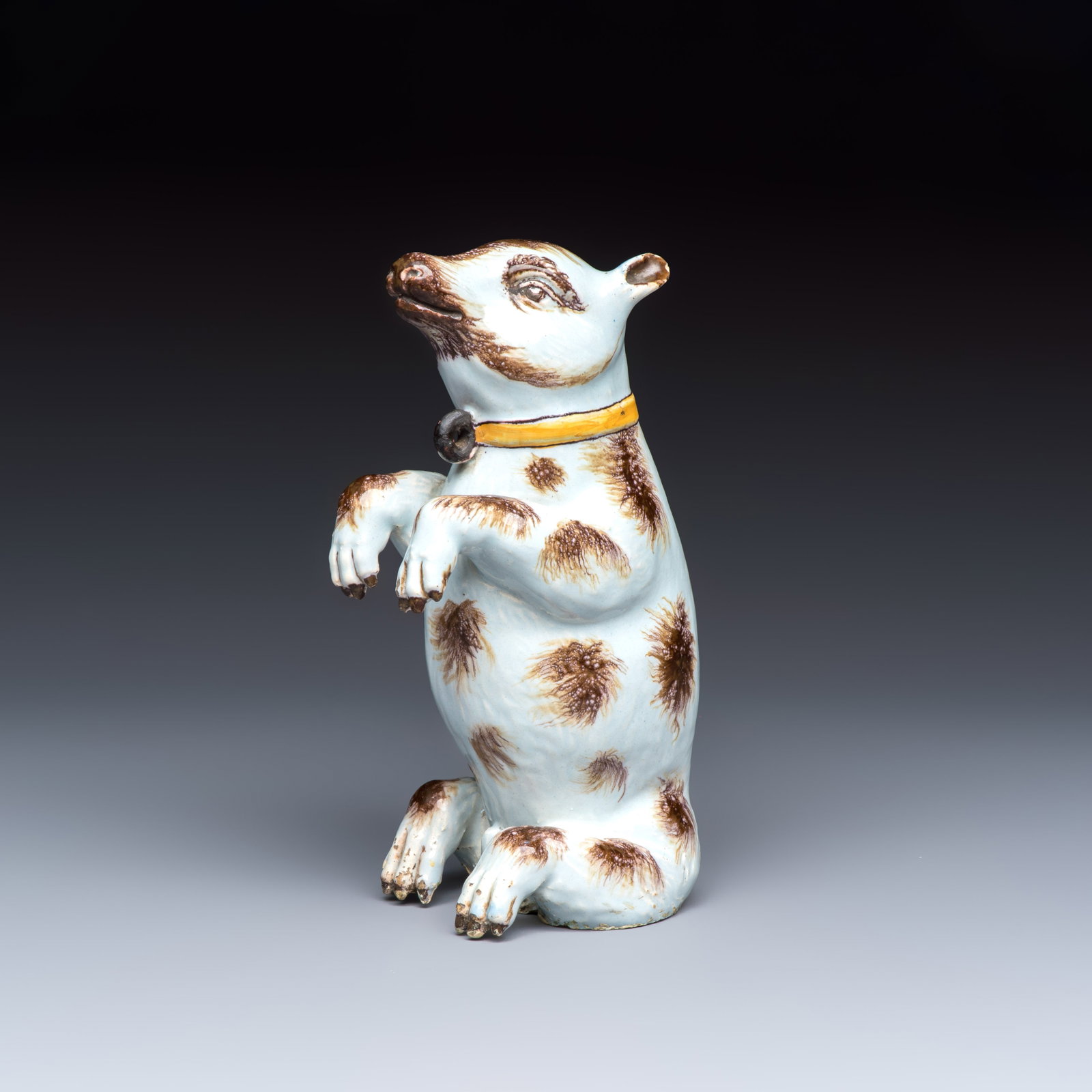 A rare polychrome Dutch Delft model of a seated bear, 18th C.: A rare polychrome Dutch Delft model of a seated bear, 18th C. H.: 21,5 cm Provenance: The Van Hyfte Collection With Aronson Antiquairs, published in their catalogue 'Highlights of the Van Hyfte Collec