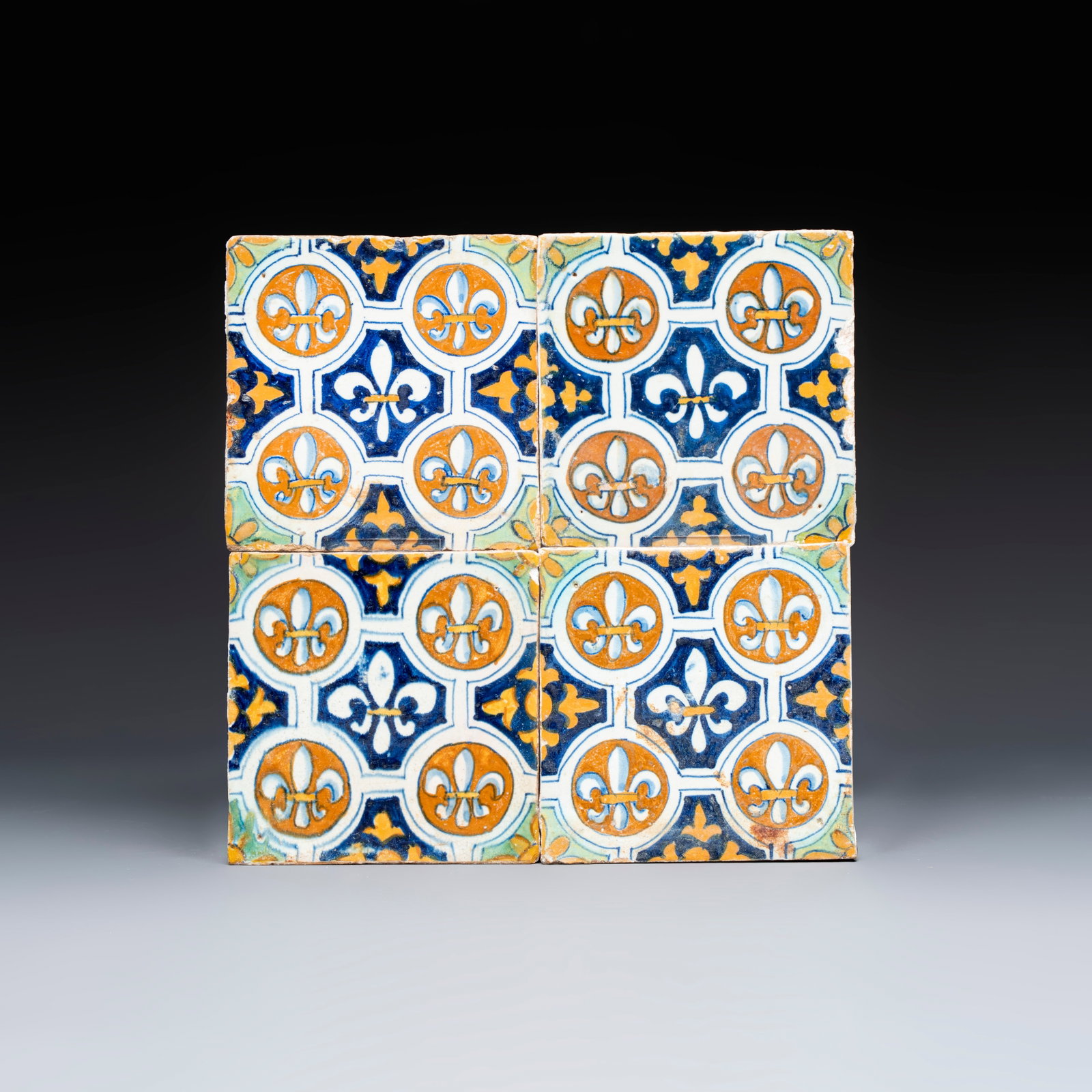 A set of four rare polychrome Dutch Delft maiolica tiles with fleur-de-lys, early 17th C. (1 of 10)