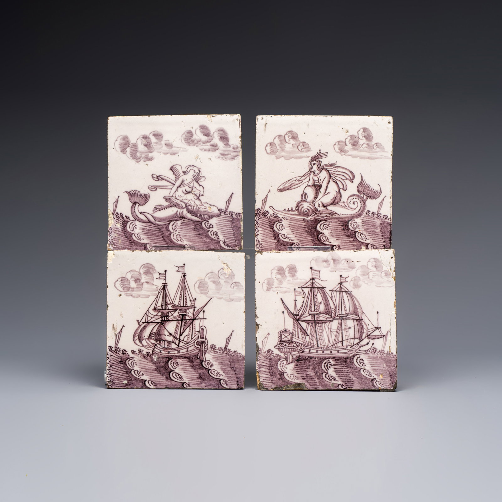 Four manganese Dutch Delft 'Sea Creatures' and 'Ships' tiles, 17th C. (1 of 2)