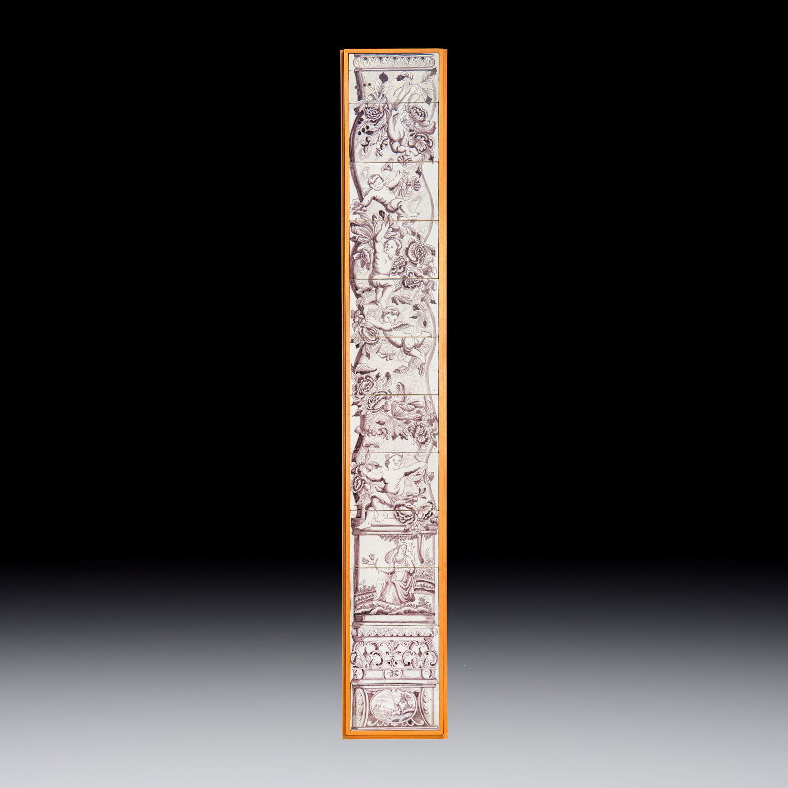 A manganese Dutch Delft 12-piece tile pillar with cherubs, 18th C. (1 of 1)