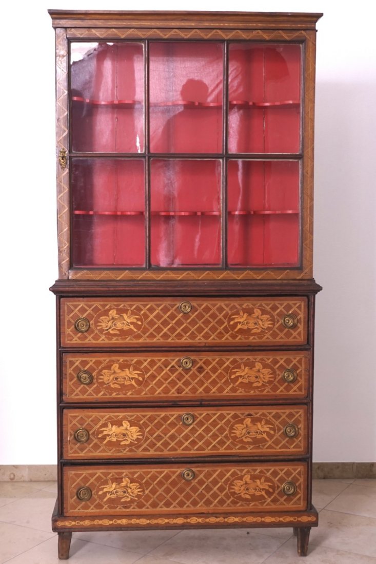 A Dutch inlaid marquetterie display cabinet, 19th C.: Dim.: 195 x 96 x 28 cm. Consisting of two parts.