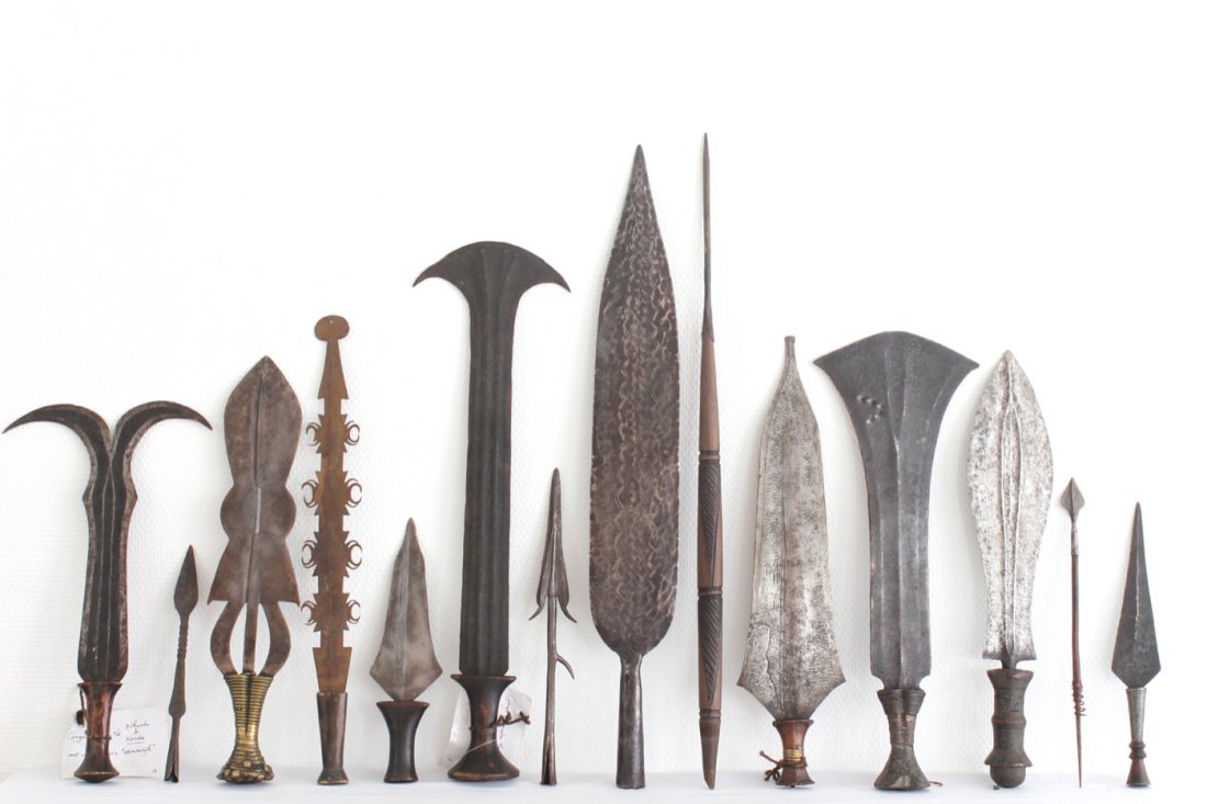 A collection of 23 various African tribal knifes and: Various dimensions. The tallest: 68 cm