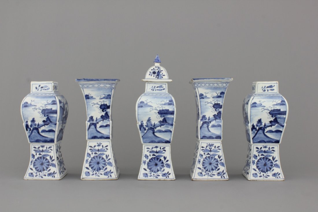 A Dutch Delft blue and white five-piece chinoiserie: H: 34 cm incl. lid, lacking two lids