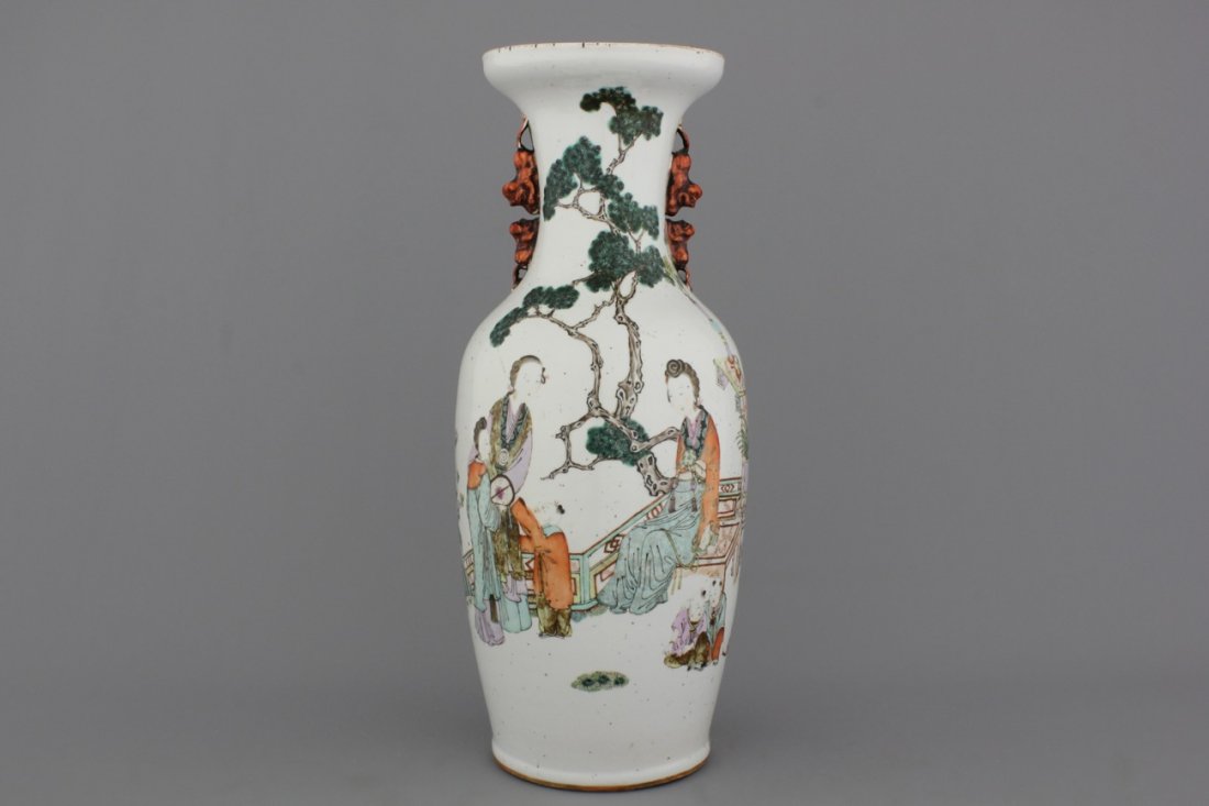A Chinese porcelain polychrome vase with ladies in a (1 of 2)