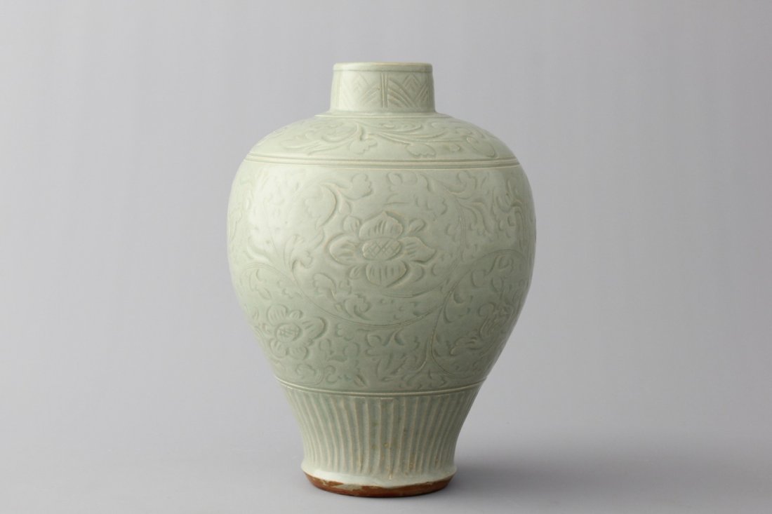 A Chinese porcelain incised celadon vase, possibly Ming (1 of 1)