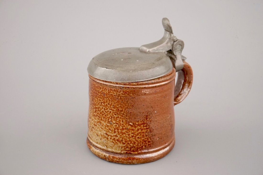 A rare Raeren tiger salt glaze pewter-mounted jug, ca.: H: 12,5 cm Condition: Very good