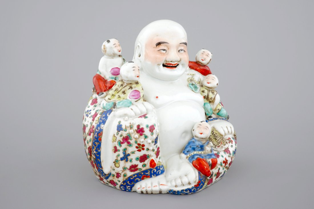 A Chinese famille rose Buddha Hotei with children,: H.: 25 cm