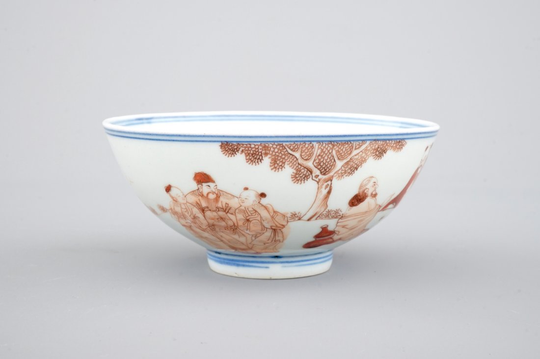 An unusual Chinese blue, white and iron red bowl, 19th: H.: 5,5 - Dia.: 12,5 cm The base with a Yongzheng four-character mark.