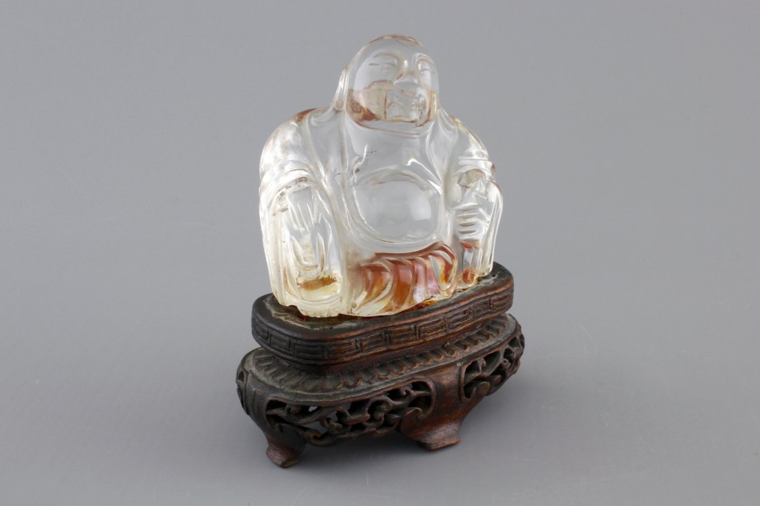 A Chinese rock crystal Buddha on stand, 18/19th C. (1 of 2)