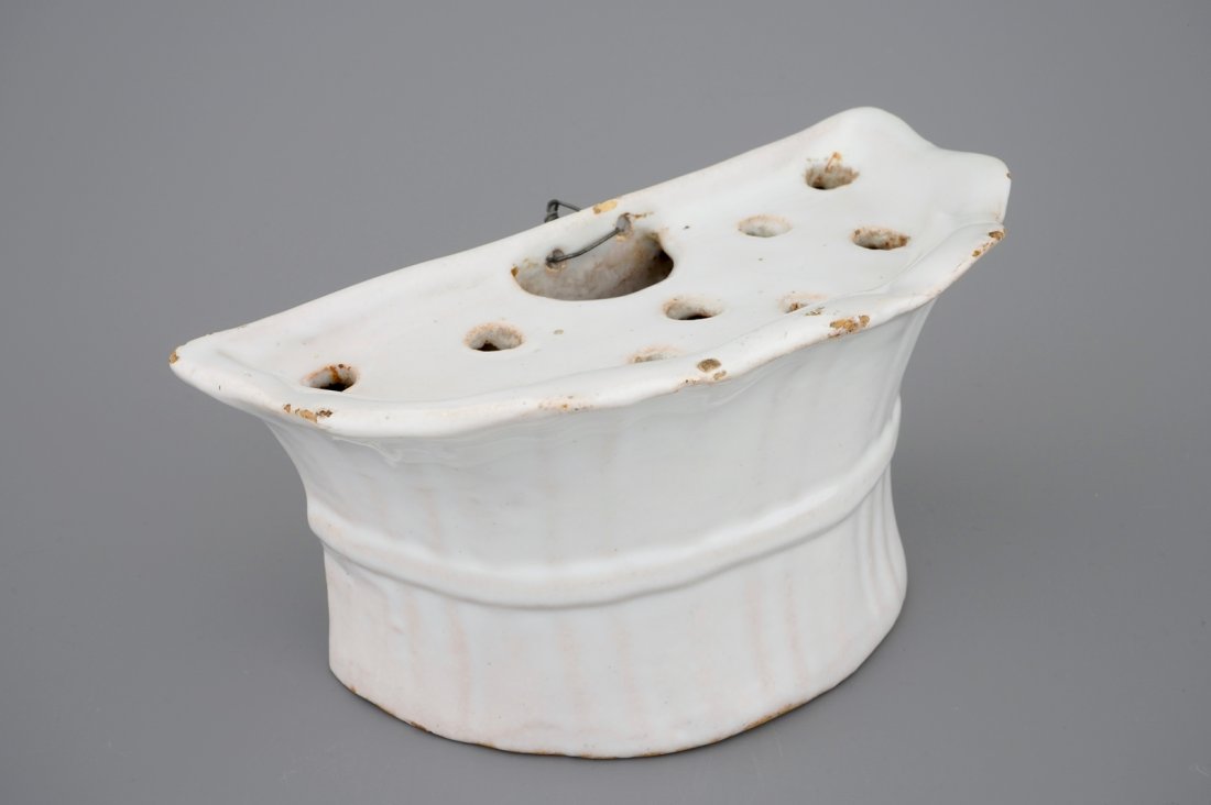 A white Delft pottery wall flower holder, 18th C. (1 of 7)