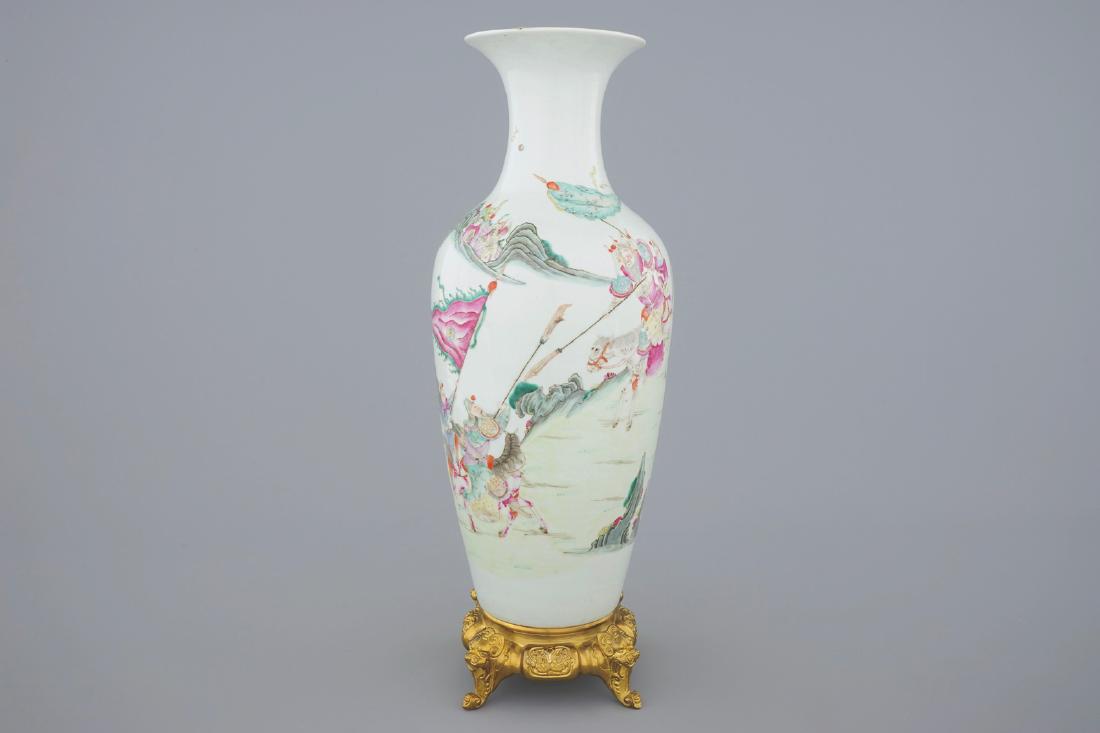 A Chinese famille rose vase on a gilt bronze stand, (1 of 8)