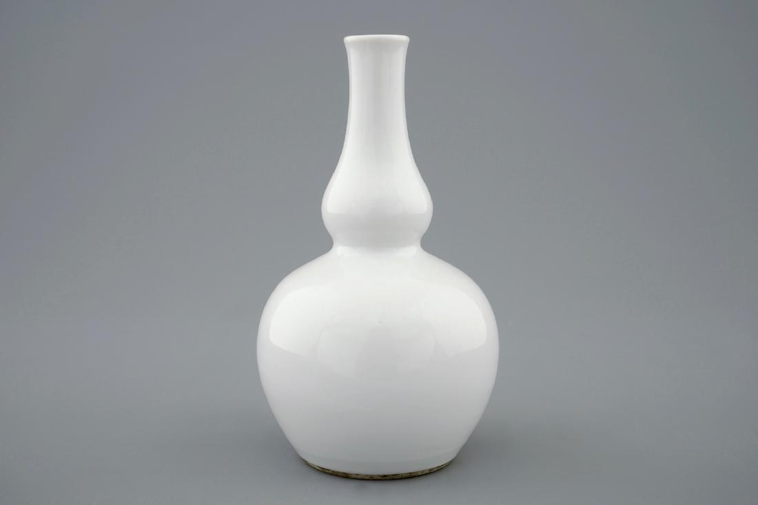 A Chinese blanc de Chine double gourd vase, (1 of 6)