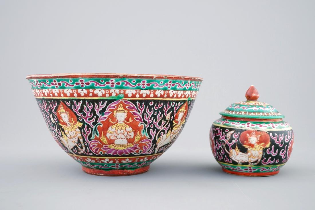 A Chinese black-ground Bencharong bowl and covered jar: A Chinese black-ground Bencharong bowl and covered jar for the Thai market, 19th C. The bowl: H.: 9,5 cm - Dia.: 17,5 cmThe covered jar: H.: 8 cm