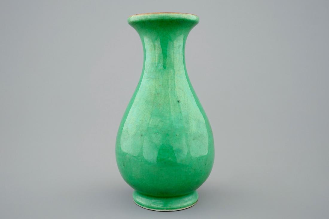 A Chinese apple green pear shaped vase, 19th C. (1 of 2)