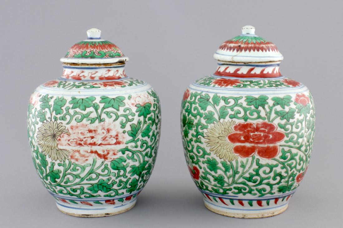 A pair of Chinese wucai porcelain vases with covers, (1 of 9)