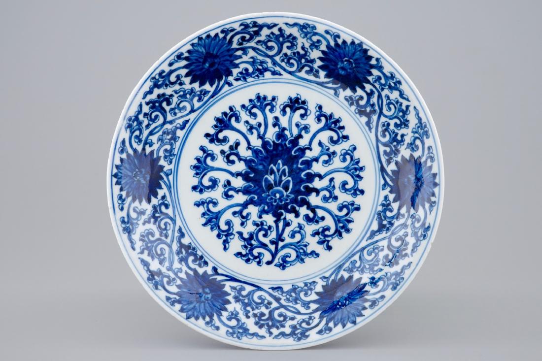 A Chinese blue and white lotus scroll plate, Xuande (1 of 2)