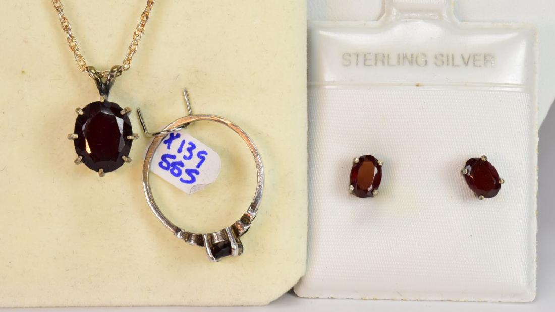 1.8ct TW Garnet Earrings, Pendant, & Ring Set: 1.8CT TW Garnet Earrings, Pendant & Chain, & Ring Set In Sterling.