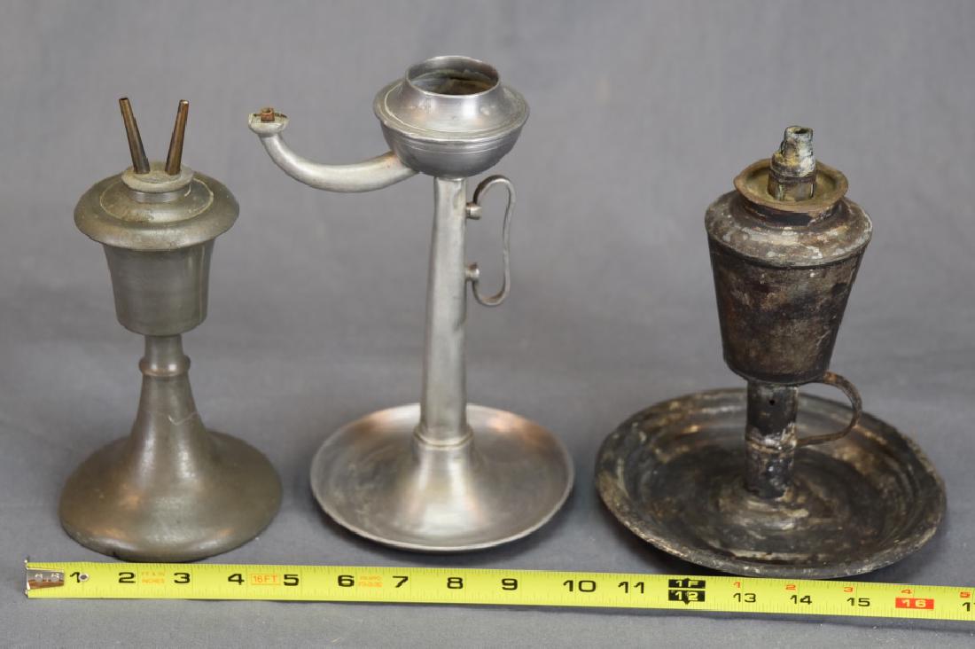 LOT OF 3 EARLY AMERICAN SPERM WHALE OIL LAMPS: 2 PEWTER 1 TIN 1. ROUND TOP WITH 2 EXTENDED ARMS SCREWS INTO VESSEL ON REVERSE BELL HORN BASE; 2. PEWTER BOWL TOP WITH LONG EXTENDED ELEPHANT TRUNK ARM, DISH BASE; 3.TIN SCREW OFF TOP WITH SINGEL REED