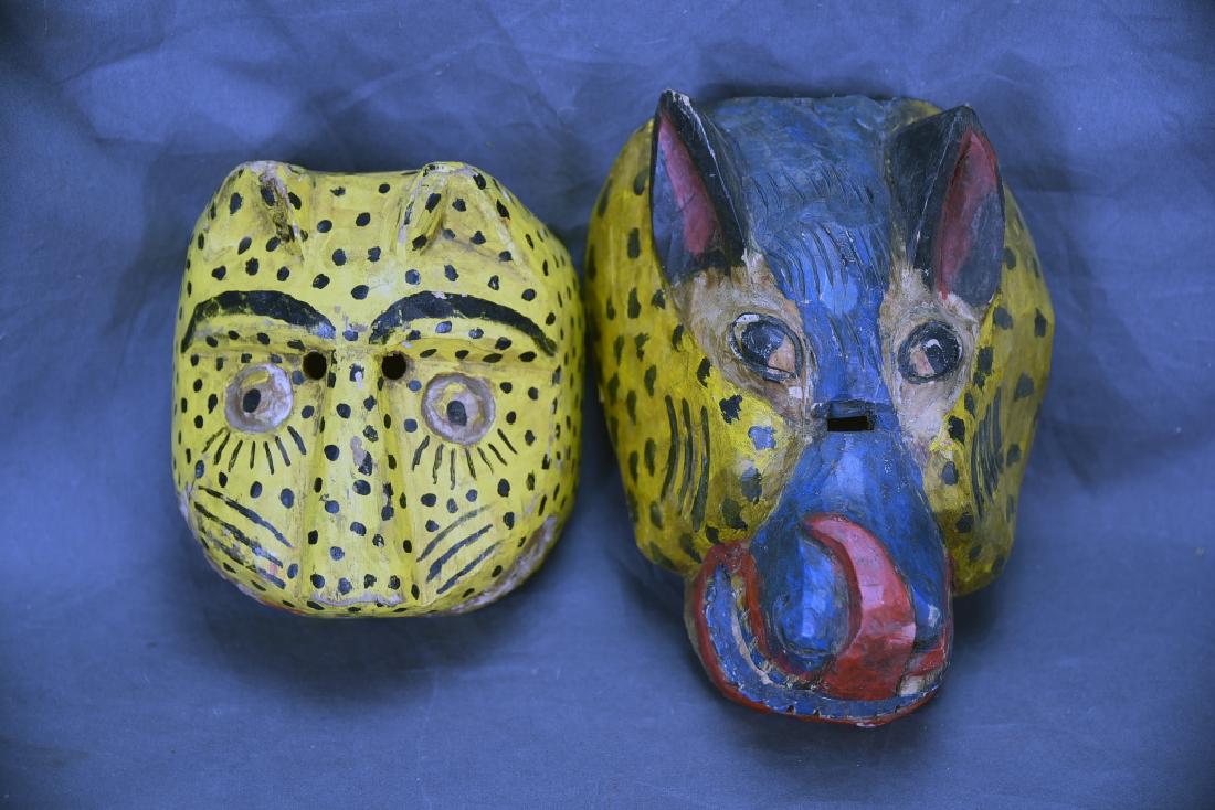 2 Hand Carved and Painted Wooden Face Masks (1 of 3)