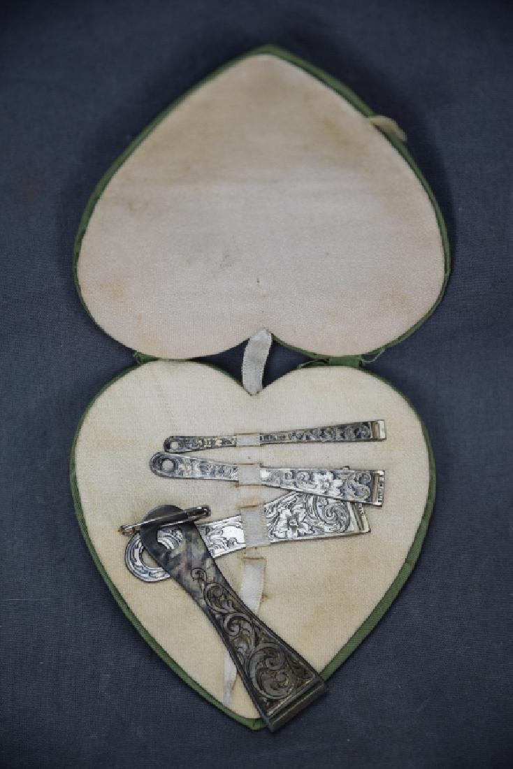 Set of 4 Engraved Sterling Ribbon Bodkins: In a heart shaped case. 2 3/4" long.