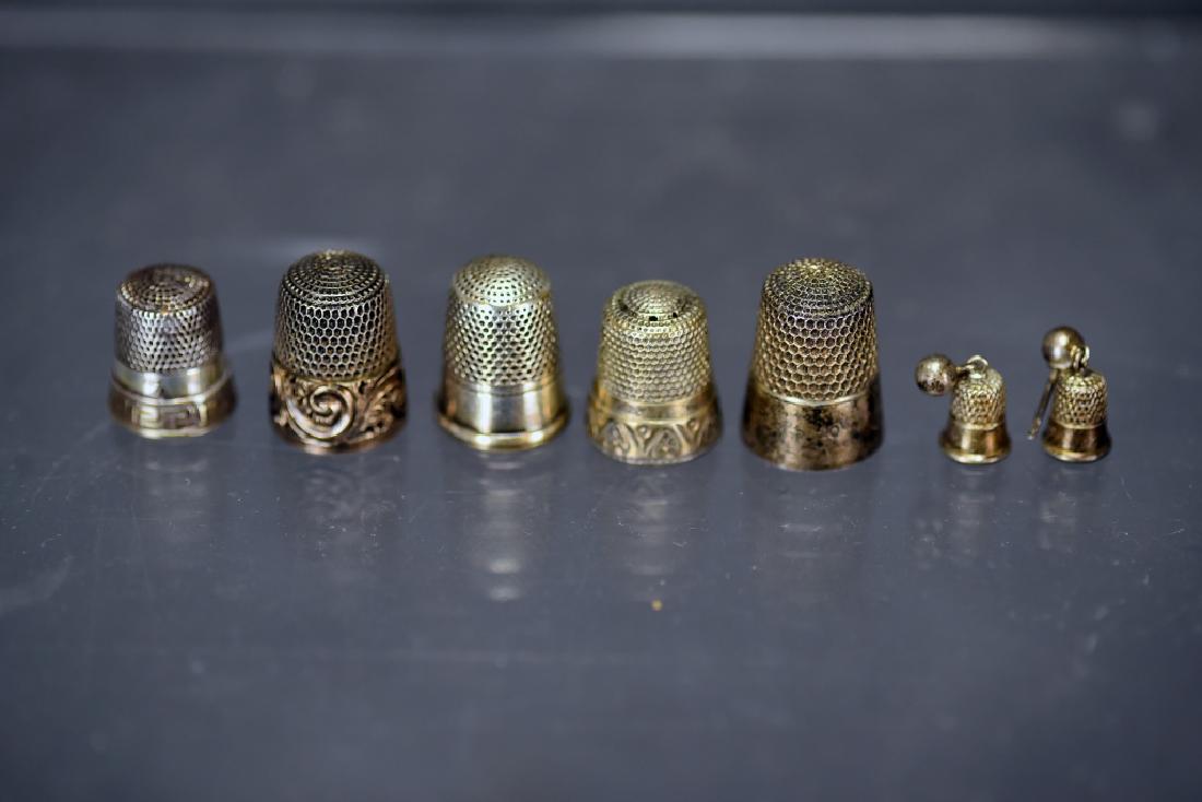 5 Sterling Silver Thimbles, Thimble Earrings: Smallest size 7, largest size 10. The thimbles on the earrings measure 3/8".