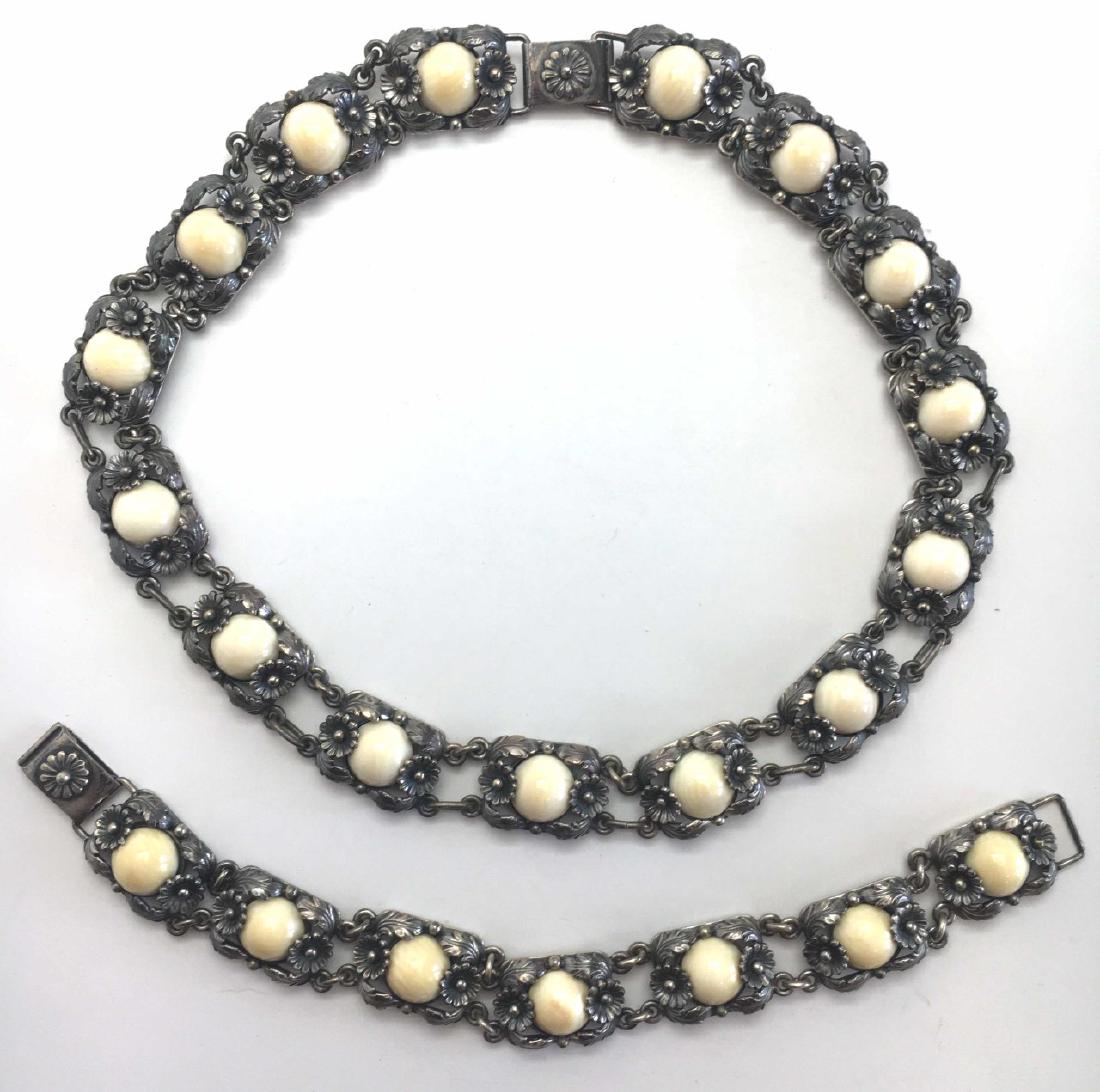 From Sterling and Agate Necklace, Earrings Norway: A beautifully made set in sterling from Niel Erik From, Norway. It is set with cream colored stones, possibly agate. Signed.