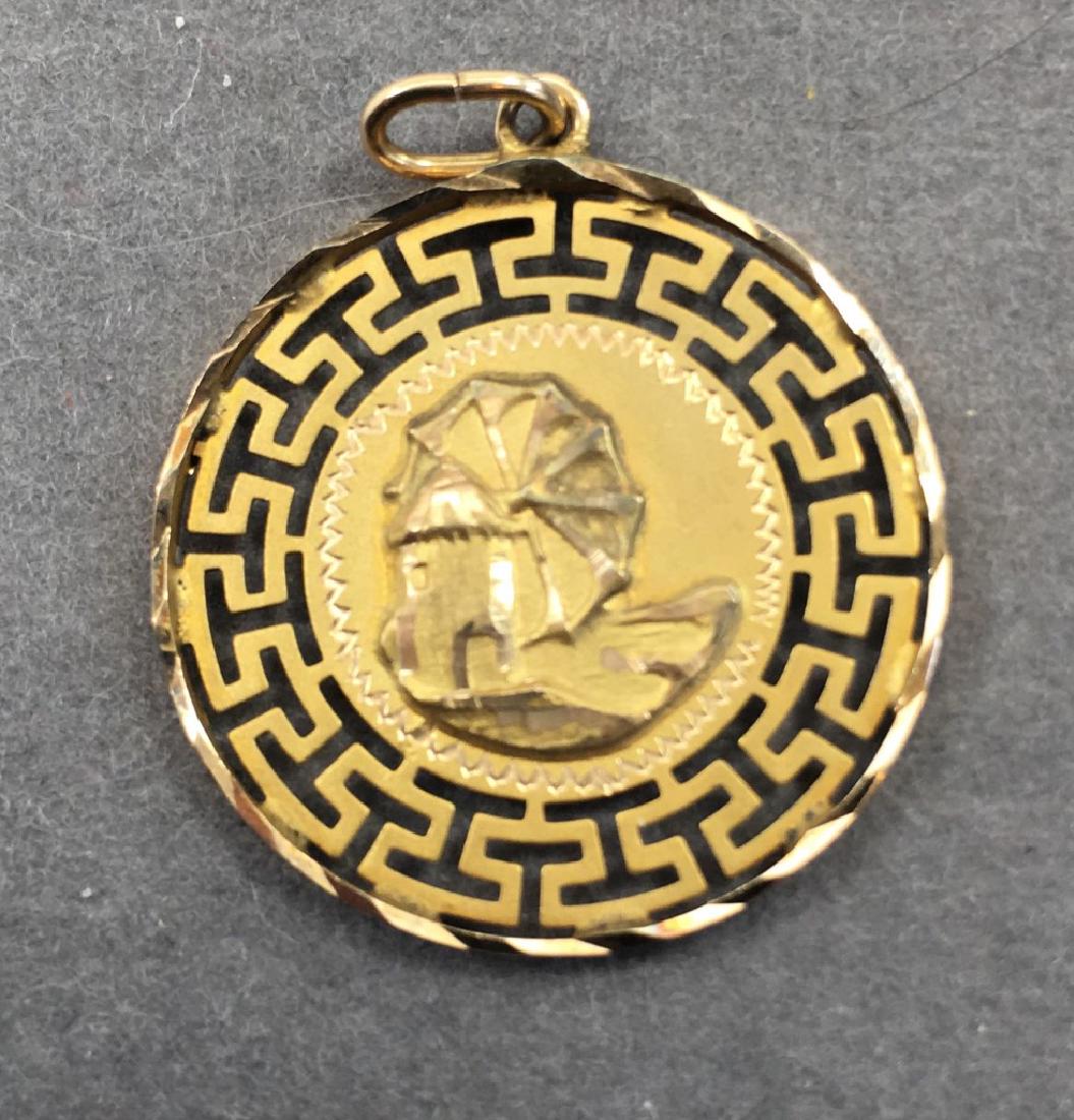 14K Greek Pedant Medallion Dimitra Mikonos: Marked 585. Approximate total weight 2.8 grams.