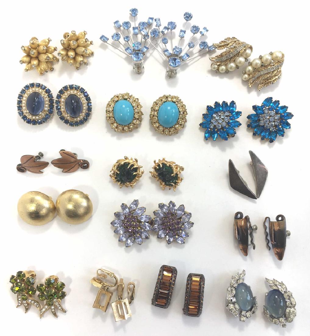 16 Pairs Midcentury Designer Clip Earrings, Signed: Most are signed, the designers include Vendome, Trifari, Jomaz, Boucher, Ciner, Weiss, Eisenberg Ice, Rebajes, Blair Delmonico and Vogue.