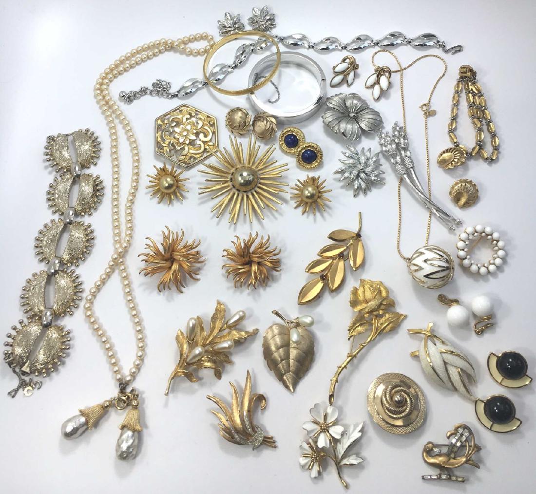 Large Lot Mid Century Modern Costume Jewelry: Includes pieces by Trifari, Monet and more as shown.
