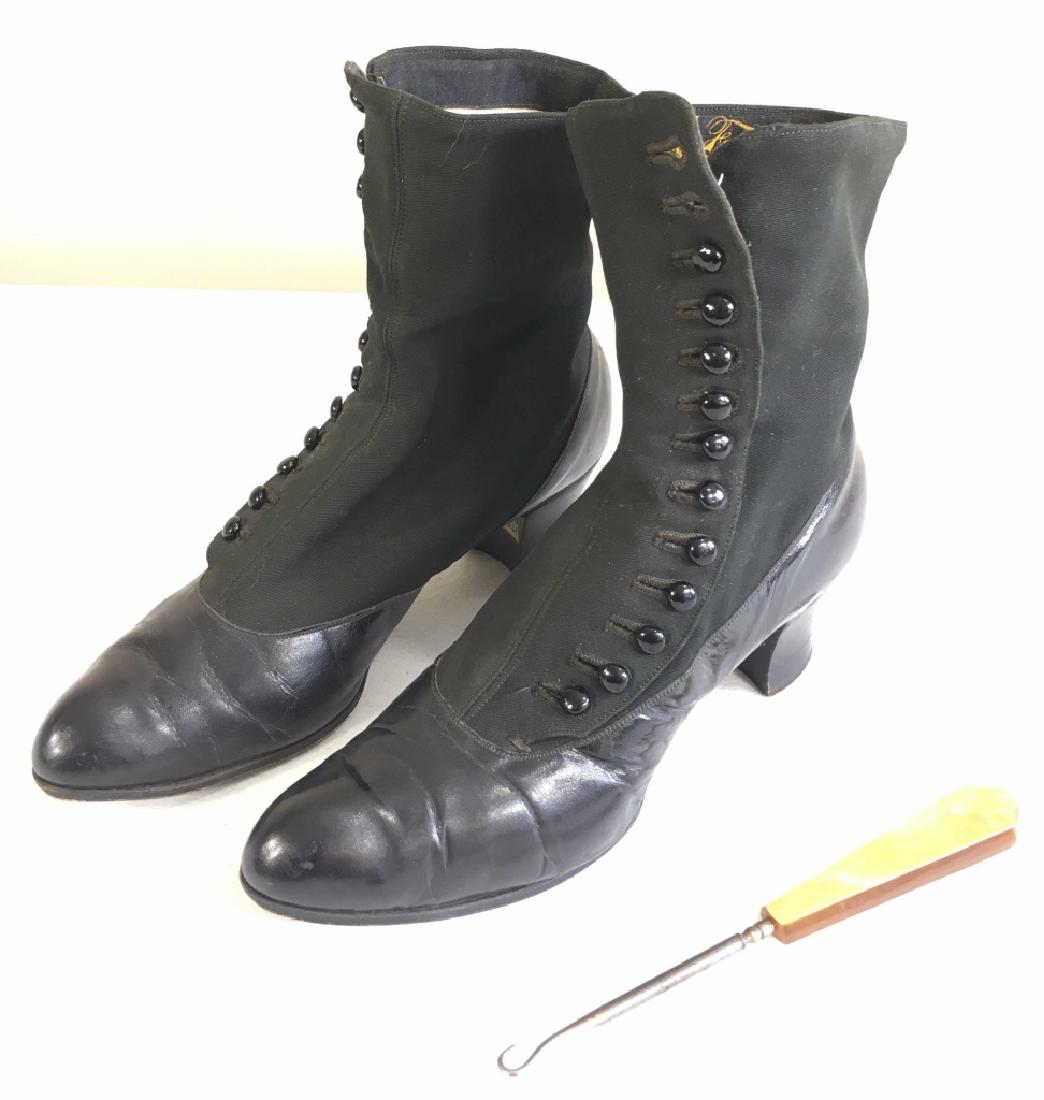 Vintage Victorian Ladies High Button Shoes: In black leather and fabric. Labeled Foster Co. Also includes a celluloid handled button hook.