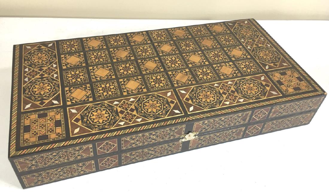 Handmade Damascus Inlay Chess and Backgammon Board: A hinged box with a chess board on one side and a backgammon board on the other. Intricately inlaid, a combination of mother of pearl along with beech, mahogany, orange, walnut and rosewood. The open
