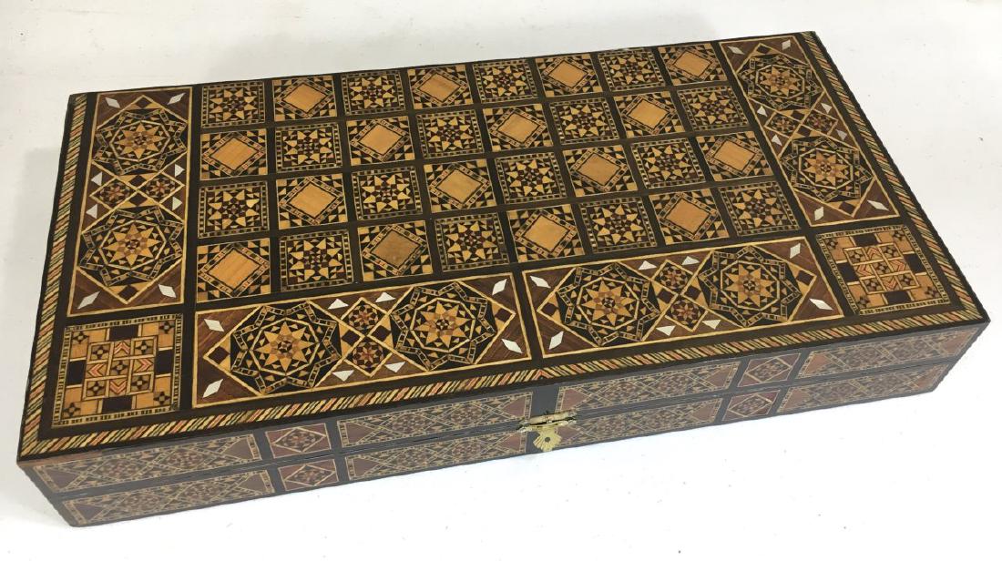 Handmade Damascus Inlay Chess and Backgammon Board: A hinged box with a chess board on one side and a backgammon board on the other. Intricately inlaid, a combination of mother of pearl along with beech, mahogany, orange, walnut and rosewood. The open