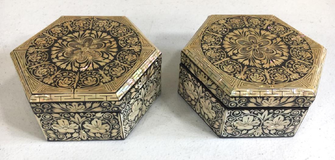 2 Damascus Mother of Pearl Inlay Trinket Boxes: 2 hexagonal boxes in lacquer, abalone and mother of pearl. They measure approximately 4 1/4" across.