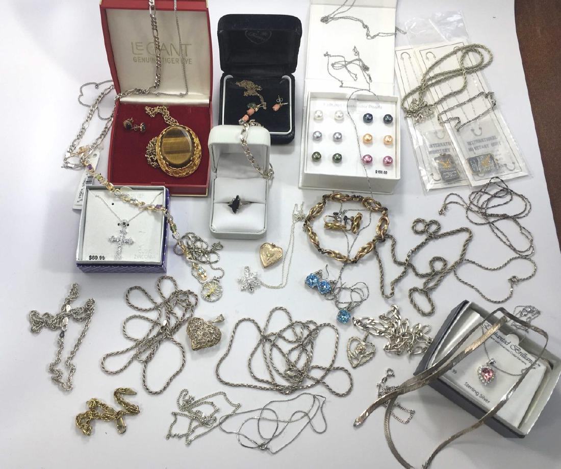 Mixed Group Estate Jewelry - Sterling Silverâ€¦: Quite a bit of sterling silver in this lot also freshwater pearls, tiger eye, gold filled items and more as shown.