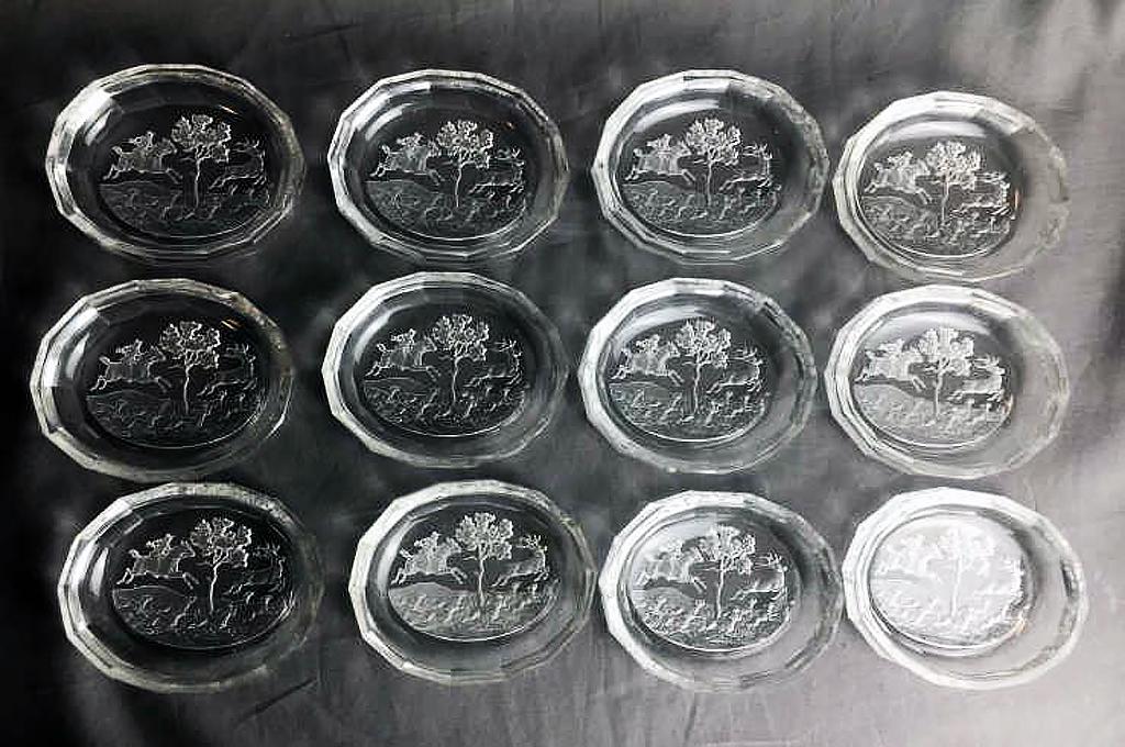 12 Czech Salt Cellars with Hunt Scene Intaglios: They measure approximately 3 5/8" wide. 1 with a chip.