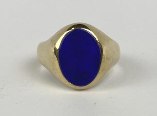 Tiffany & Co. 14K and Lapis Men: Tiffany & Company 14K yellow gold signet ring with a bezel set flat oval Lapis Lazuli. Marked Tiffany & Co. , 14K and engraved with the initials J.S. Approximate size 12.25 Total weight 13.67 grams