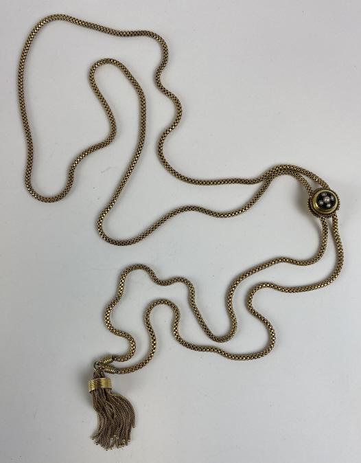 Victorian Gold Filled Slide Chain with Seed Pearls: Finely made necklac ending in a tassel, the slide embellished with seed pearls.