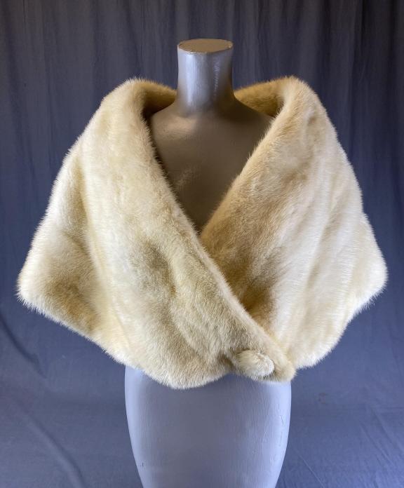 Vintage Blonde Mink Stole: Cream colored mink stole from an estate of the family of R. E. Olds of Lansing Michigan. There are a few spots in the lining as well as some pulled stitching Also in the satin lining. Laying flat it m